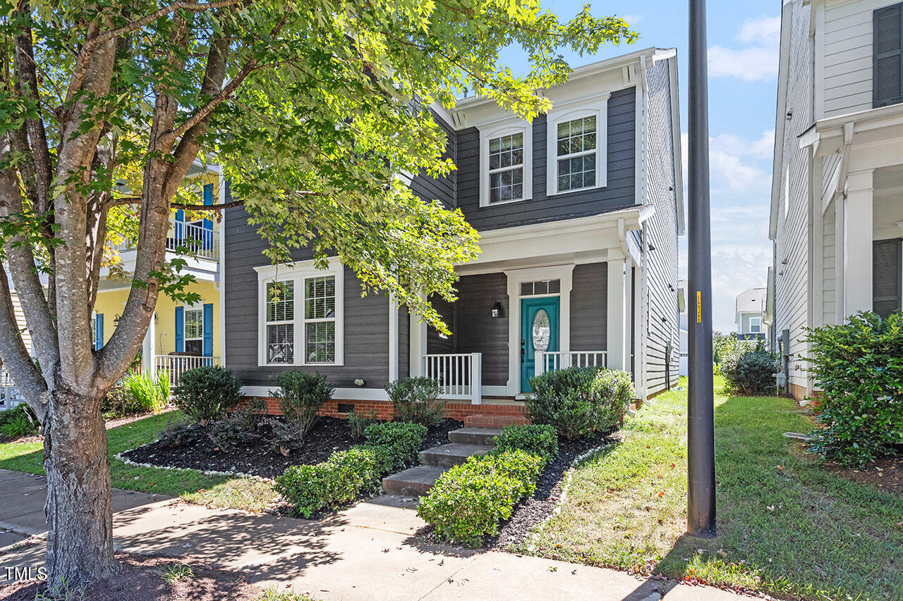 1337 Formal Garden Way Raleigh, NC 27603 - Photo 2 of 36 a front view of a house with garden