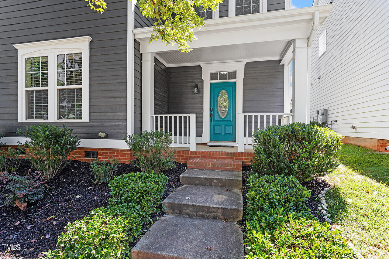 1337 Formal Garden Way Raleigh, NC 27603 - Photo 3 of 36 a front view of a house with a yard