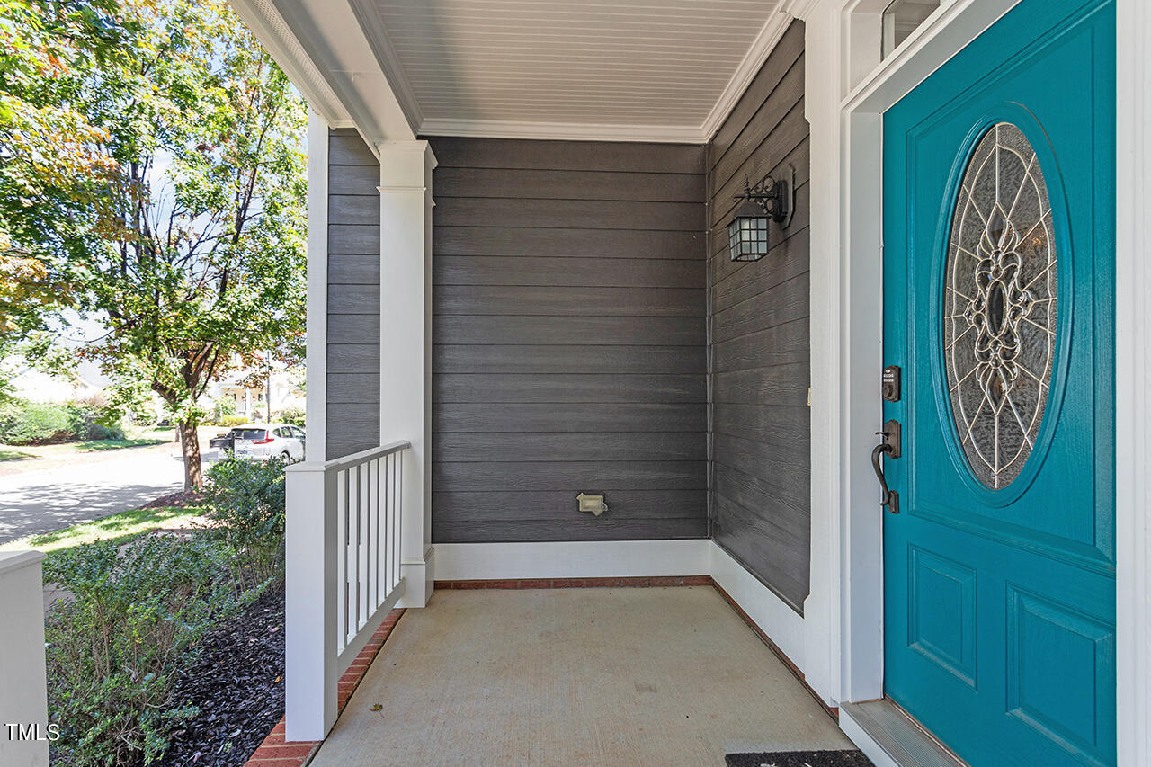 1337 Formal Garden Way Raleigh, NC 27603 - Photo 4 of 36 a view of a door and chair in the balcony