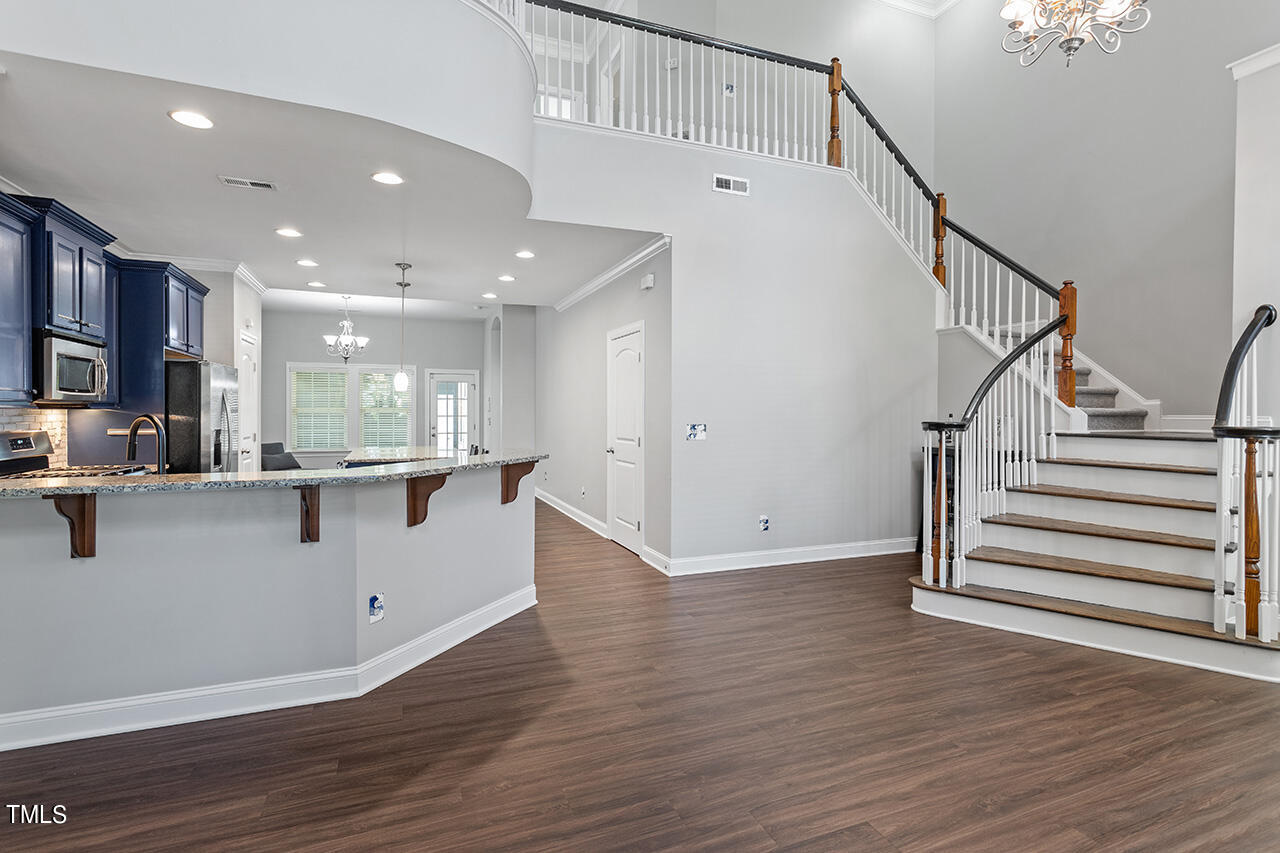 1337 Formal Garden Way Raleigh, NC 27603 - Photo 6 of 36 a view of kitchen with wooden floor and electronic appliances