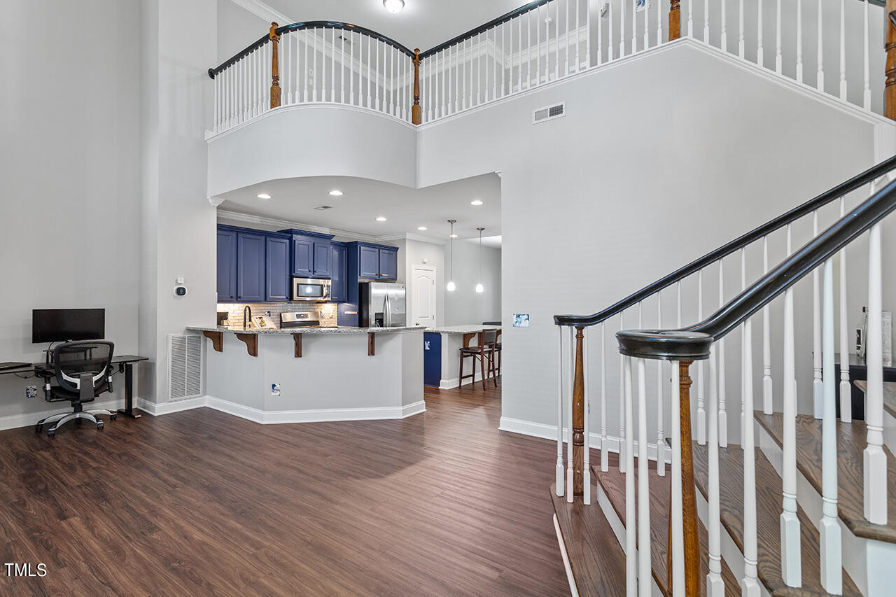 1337 Formal Garden Way Raleigh, NC 27603 - Photo 7 of 36 a view of kitchen with furniture and wooden floor
