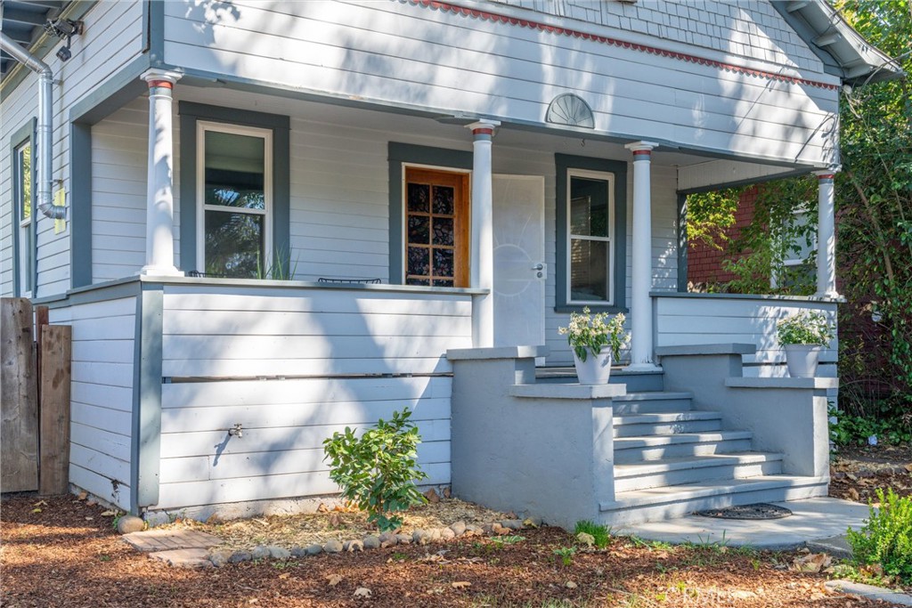 1805 Hemlock Street Chico, CA 95928 - Photo 13 of 61 a front view of a house with a yard