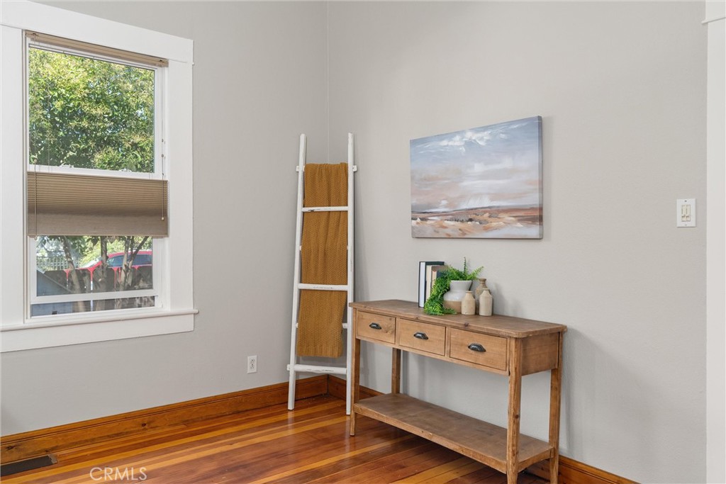 1805 Hemlock Street Chico, CA 95928 - Photo 18 of 61 a bedroom with a bed and a window