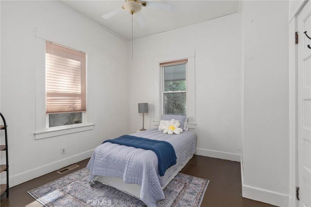 1805 Hemlock Street Chico, CA 95928 - Photo 28 of 61 a bedroom with a bed and a window