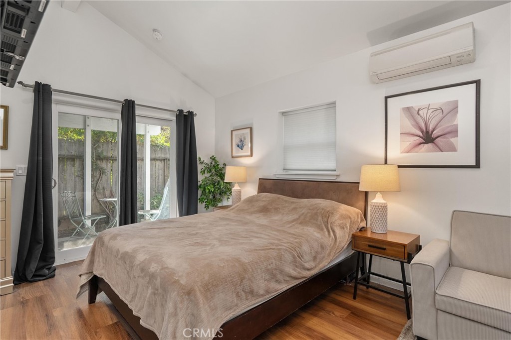 1805 Hemlock Street Chico, CA 95928 - Photo 50 of 61 a bedroom with a bed and a painting on the wall