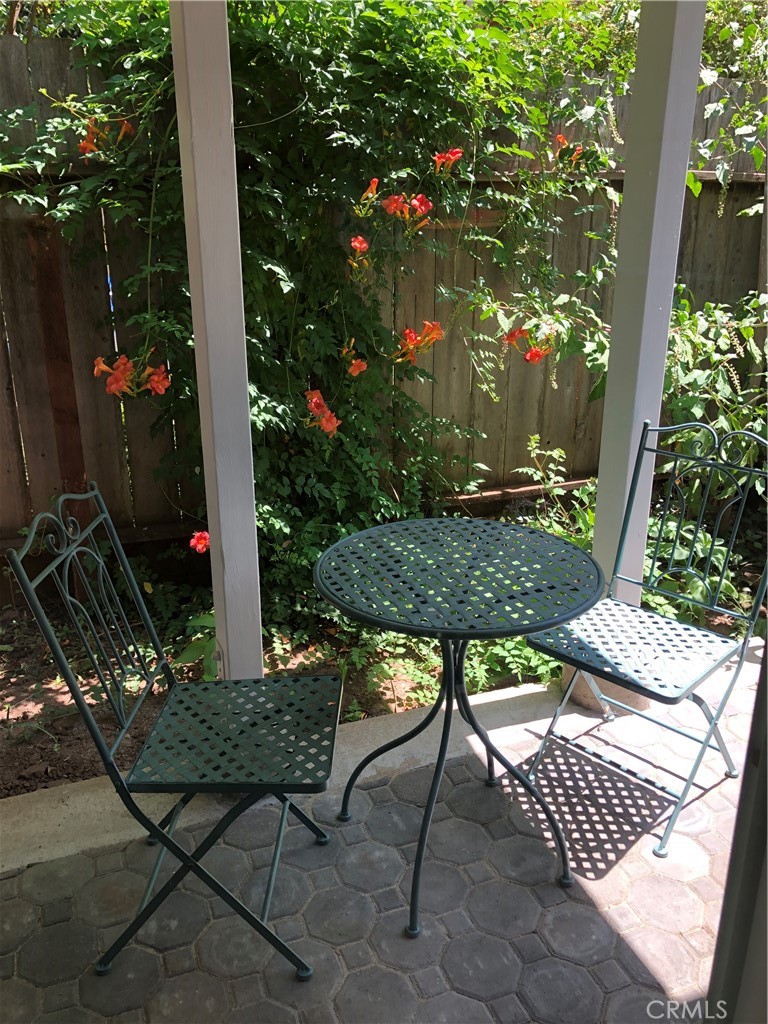 1805 Hemlock Street Chico, CA 95928 - Photo 61 of 61 a view of a chairs and tables in the backyard