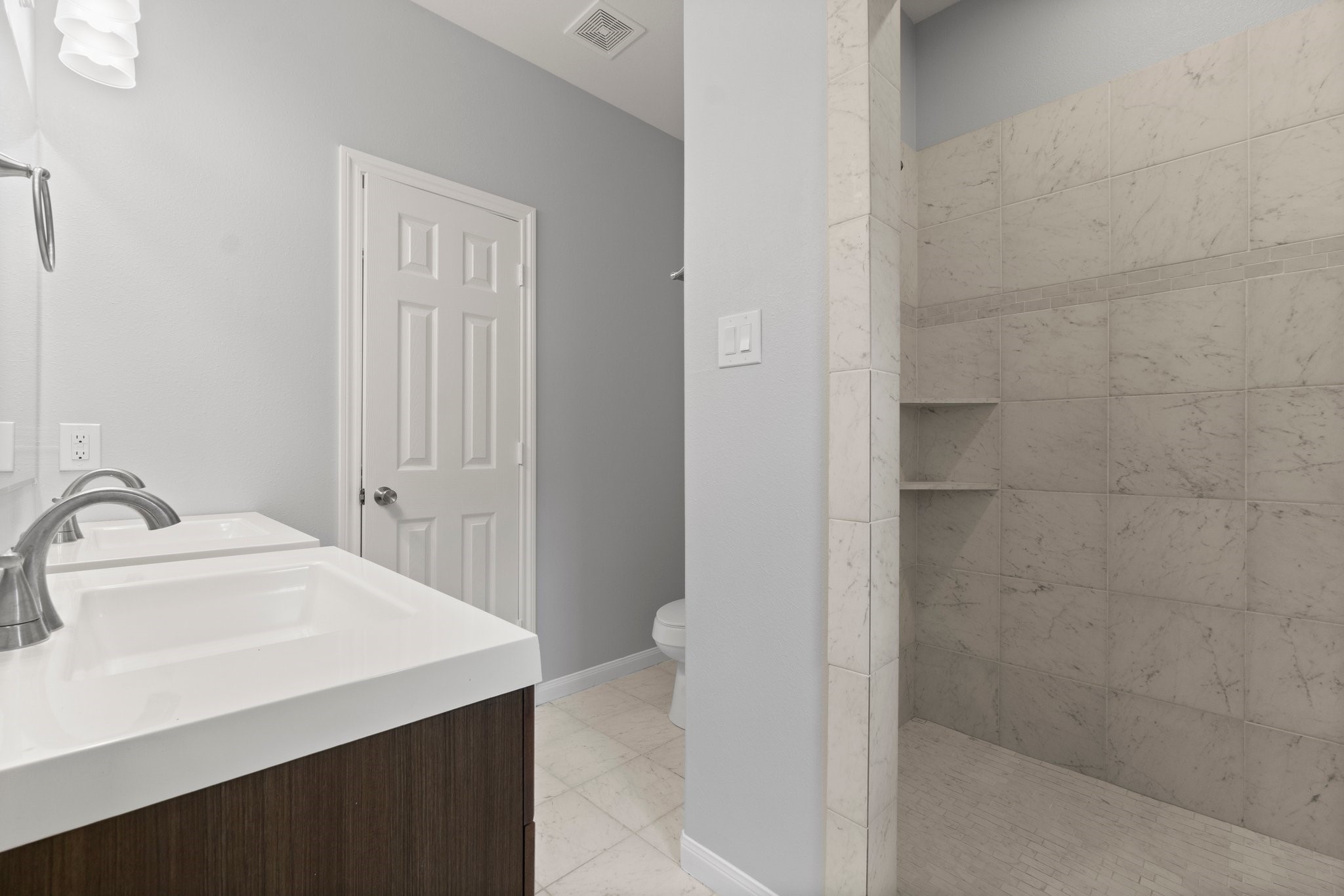 16866 West Hammon Montgomery, TX 77316 - Photo 19 of 21 a bathroom with a sink a toilet and shower