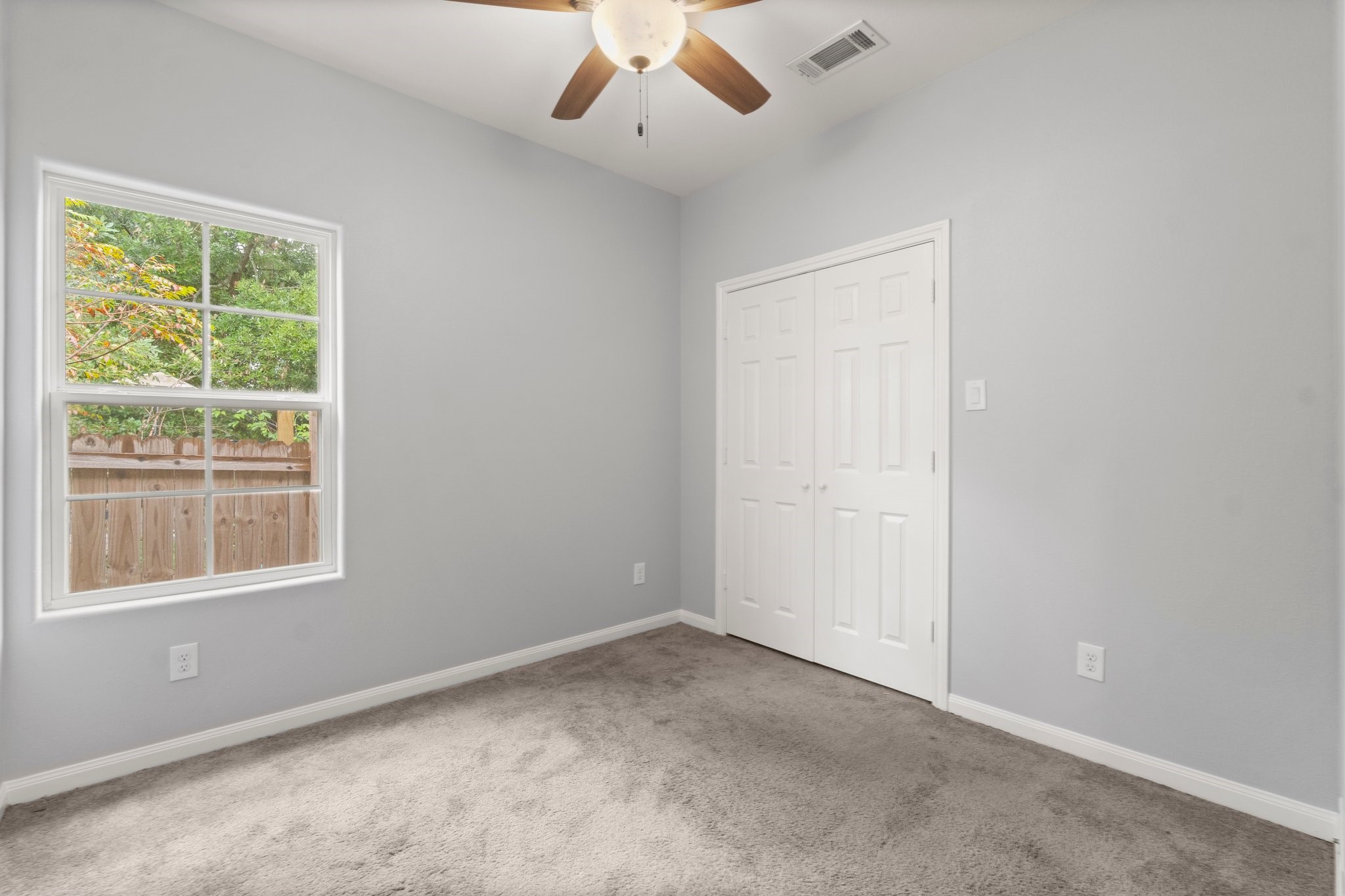 16866 West Hammon Montgomery, TX 77316 - Photo 10 of 21 an empty room with a window