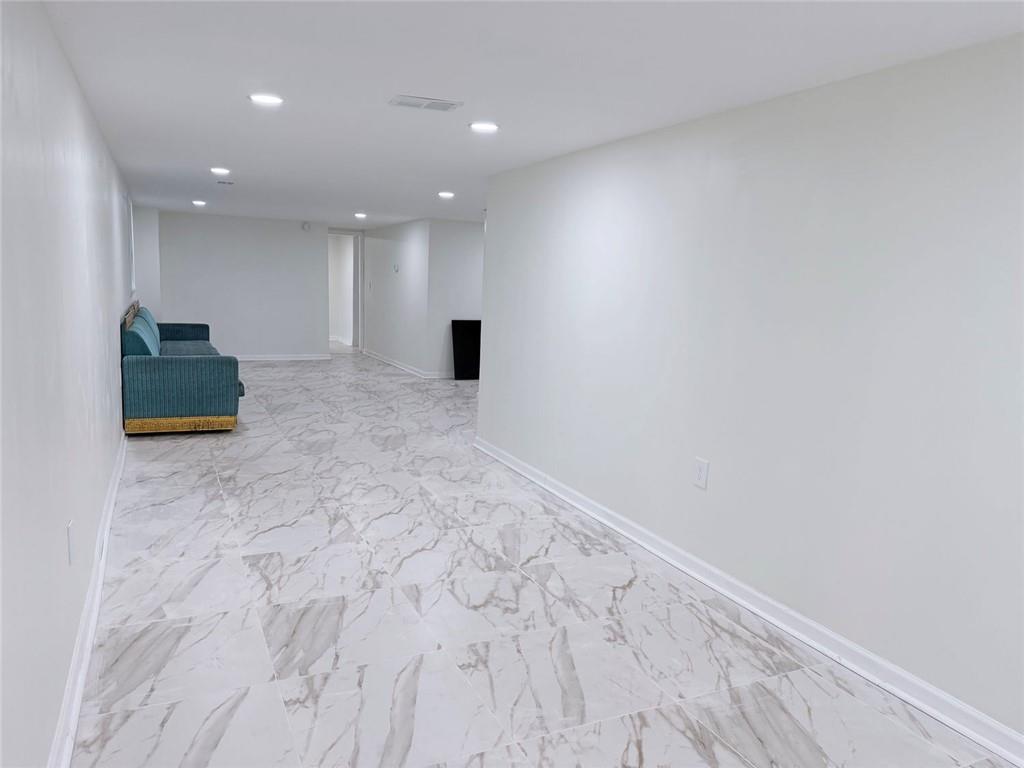 3878 Nielsen Court Clarkston, GA 30021 - Photo 21 of 26 a view of livingroom with a hallway
