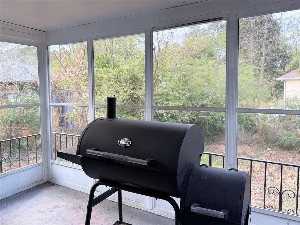 3878 Nielsen Court Clarkston, GA 30021 - Photo 24 of 26 a living room with furniture and a window