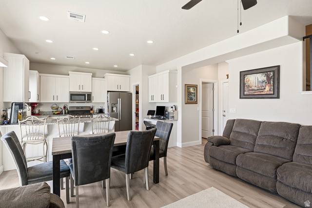 668 East Fiddlers Canyon Road, Unit 6 Cedar City, UT 84721 - Photo 4 of 36 Open-concept living area featuring light wood-finish flooring and recessed lighting