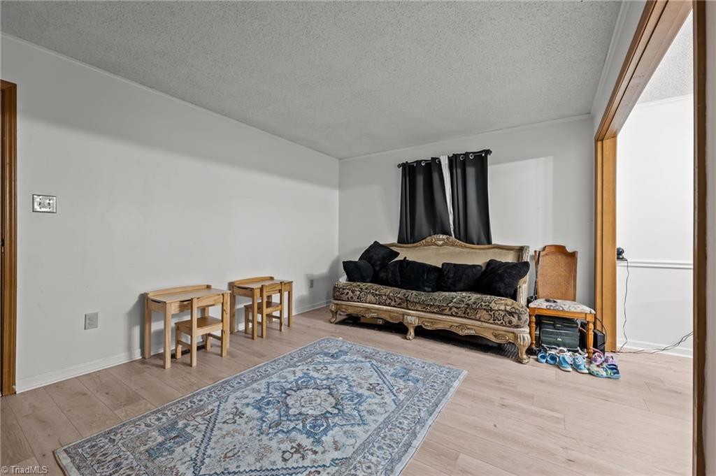 2036 Willow Road Greensboro, NC 27406 - Photo 13 of 19 New Flooring in the living spaces await its next owners!