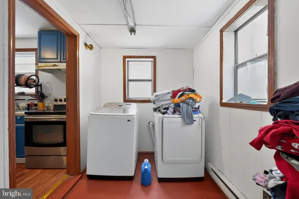 a storage room with washer and dryer