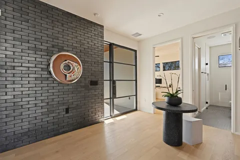 a kitchen with a table and chairs in it