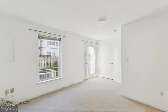 an empty room with windows