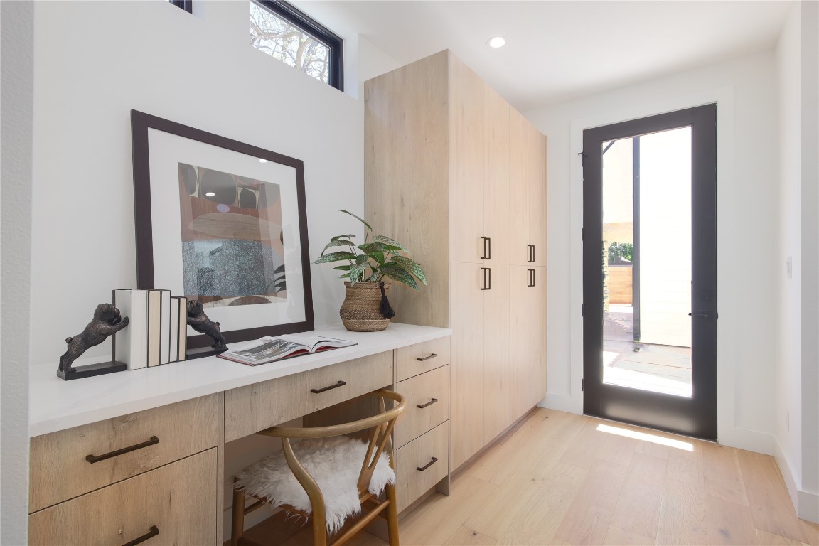 2401 Willow Street Austin, TX 78702 - Photo 16 of 38 a bathroom with a sink a mirror and a window