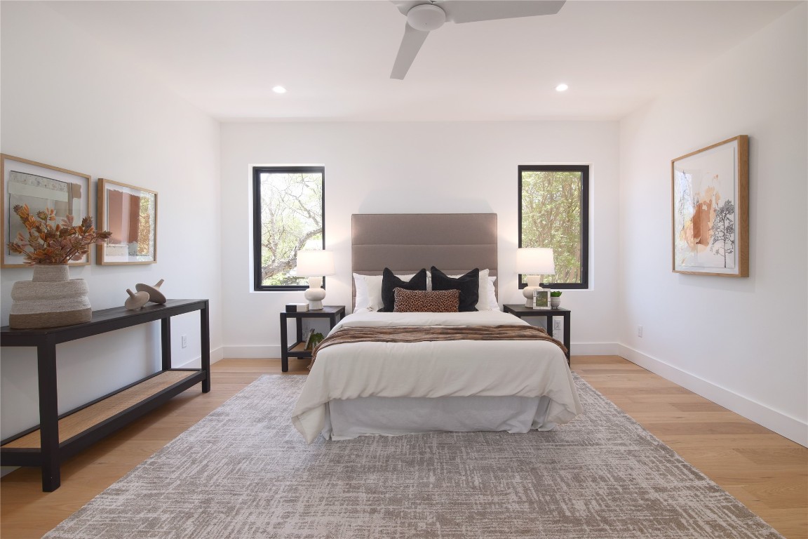 2401 Willow Street Austin, TX 78702 - Photo 20 of 38 a bedroom with a bed and window