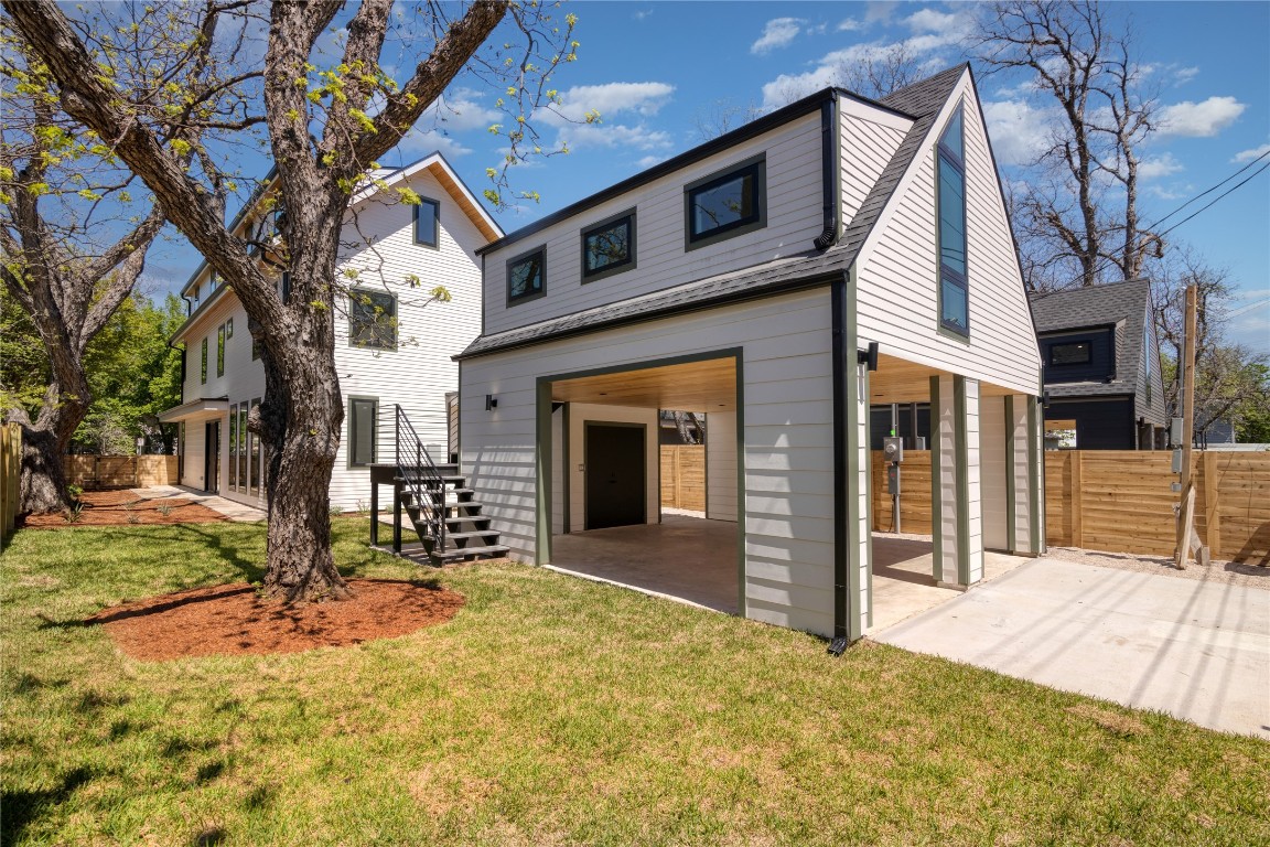2401 Willow Street Austin, TX 78702 - Photo 29 of 38 a view of a house with backyard and sitting area