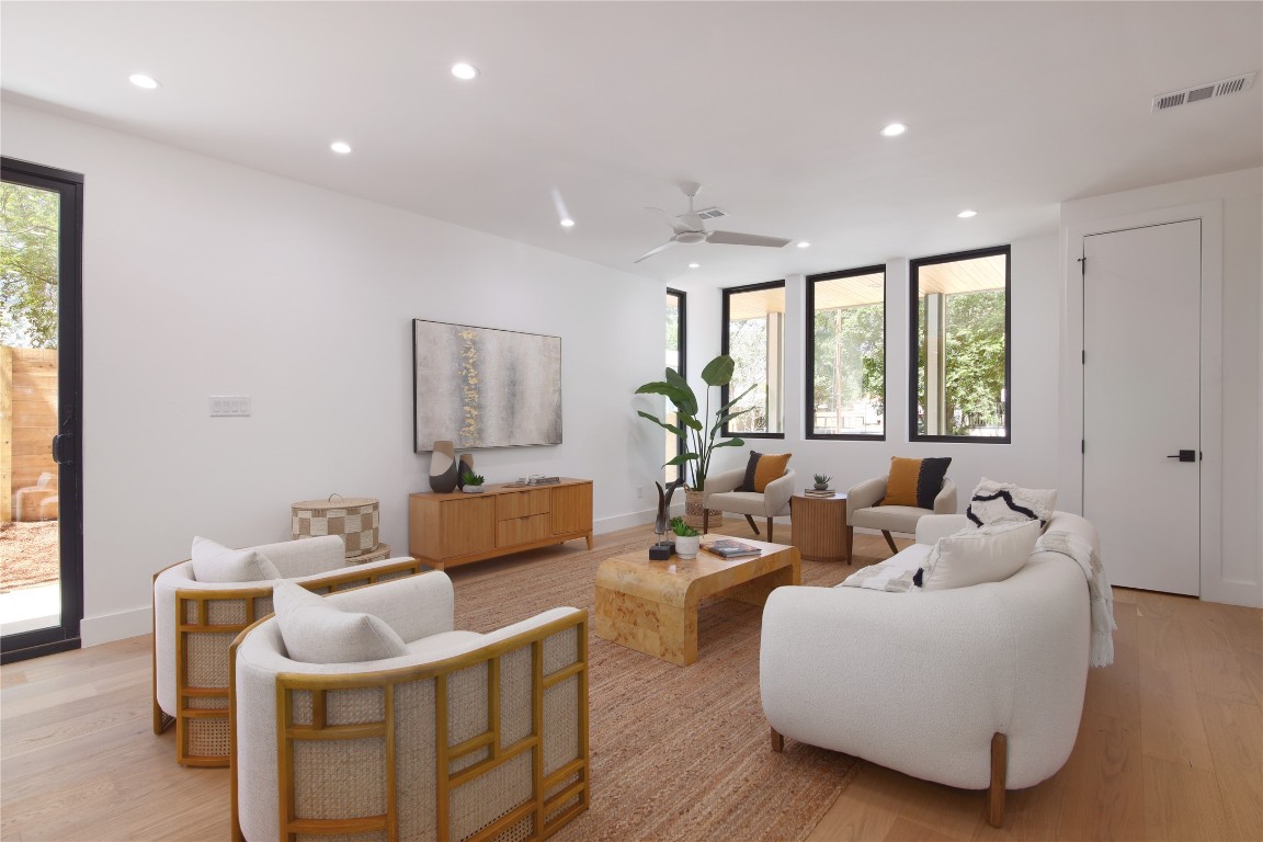 2401 Willow Street Austin, TX 78702 - Photo 5 of 38 a living room with furniture and a large window