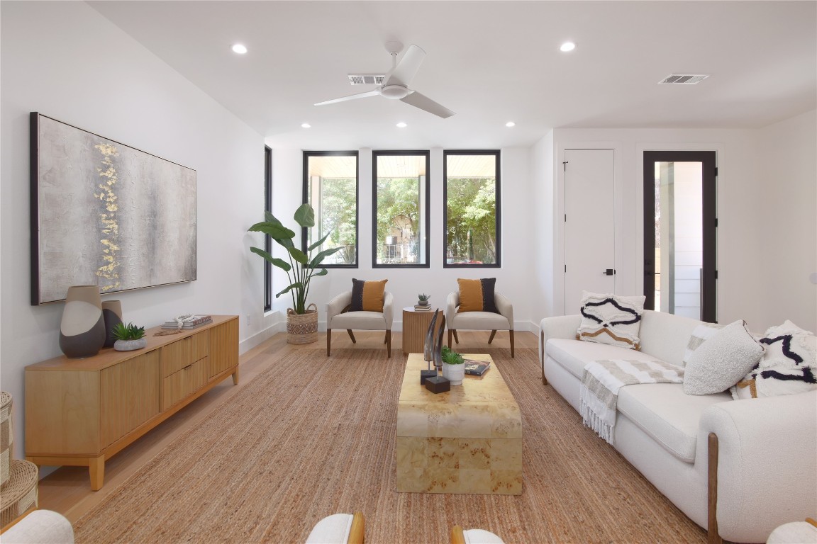2401 Willow Street Austin, TX 78702 - Photo 6 of 38 a living room with furniture and a large window