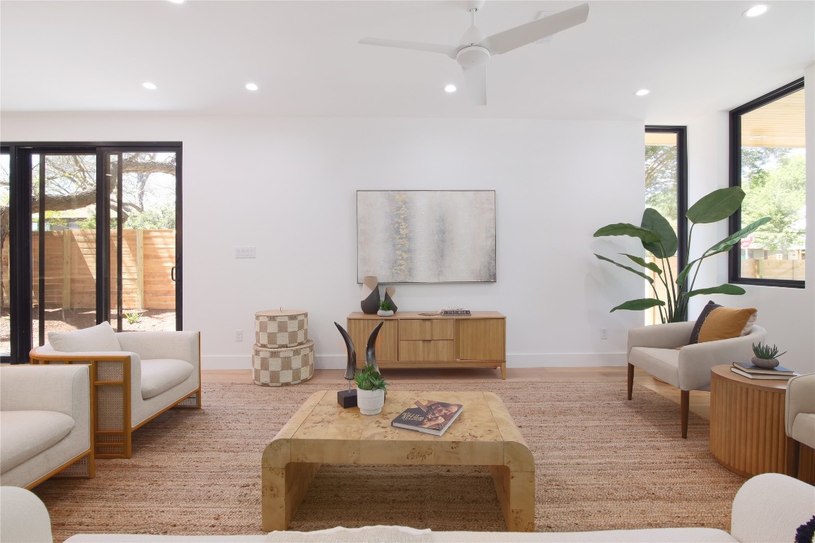 2401 Willow Street Austin, TX 78702 - Photo 7 of 38 a living room with furniture and a large window