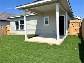 13309 Riding Drive Manor, TX 78653 - Photo 29 of 34 Covered Patio in the backyard with no neighbors to the back