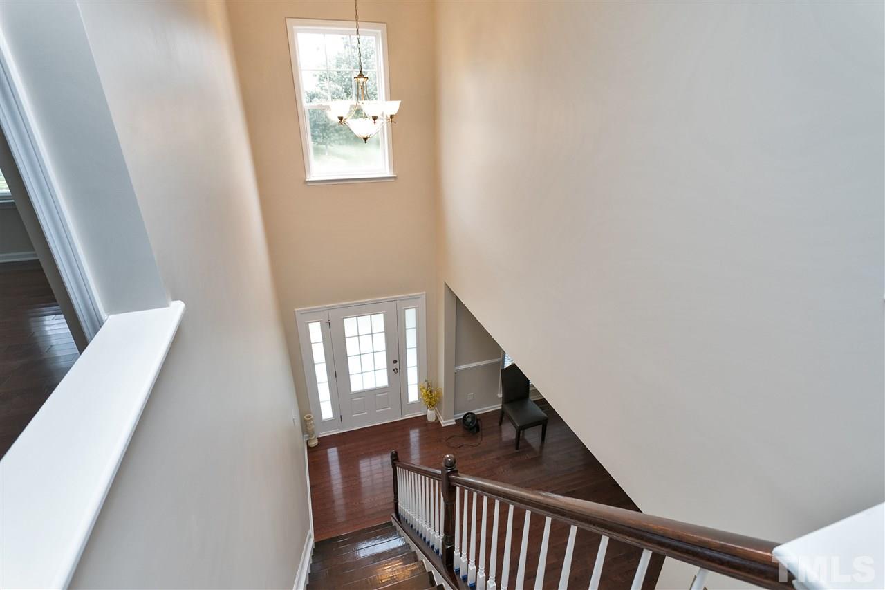 119 Key Biscayne Court Raleigh, NC 27603 - Photo 11 of 24 a view of a hallway with windows