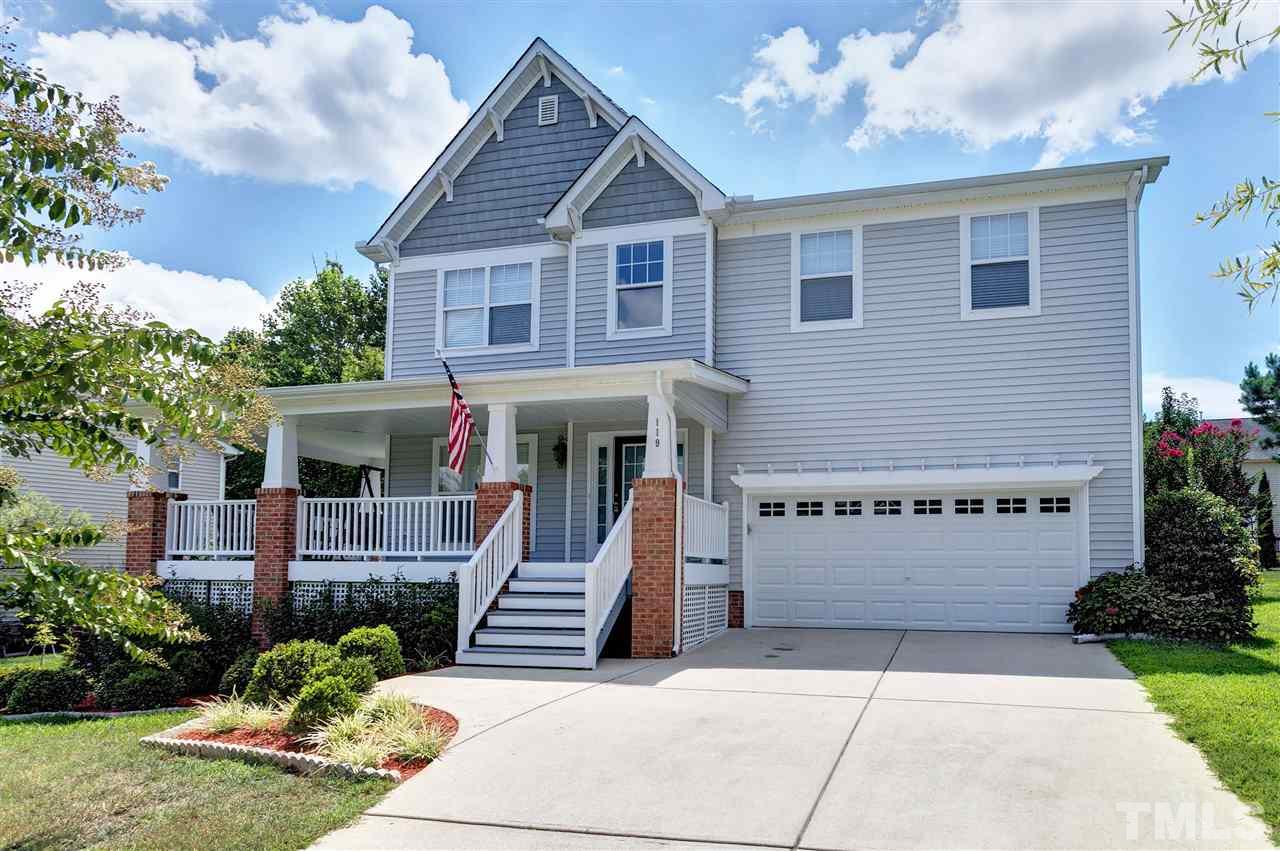 119 Key Biscayne Court Raleigh, NC 27603 - Photo 3 of 24 a front view of a house with garden