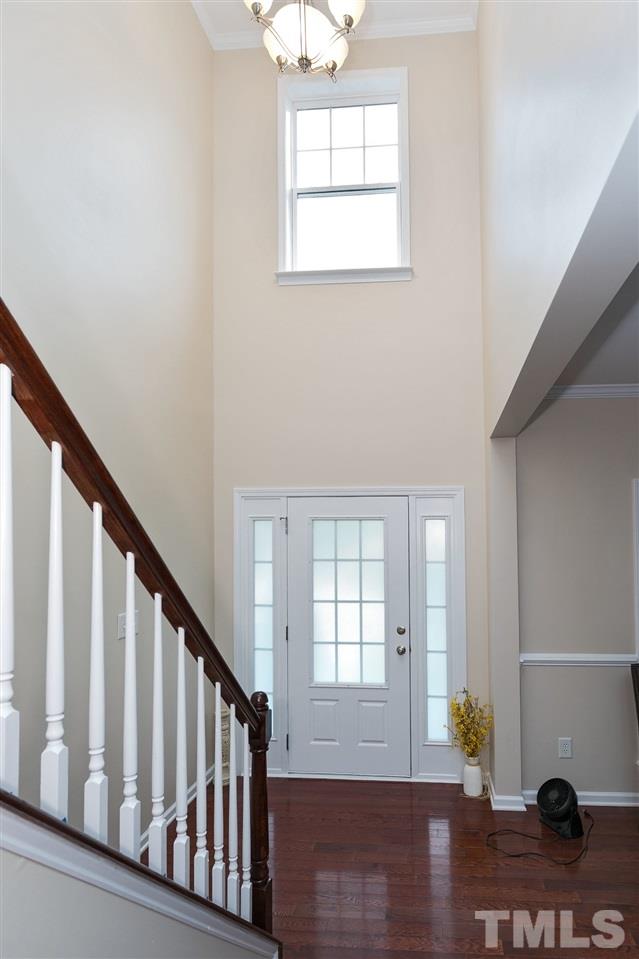 119 Key Biscayne Court Raleigh, NC 27603 - Photo 4 of 24 a view of an entryway with wooden floor