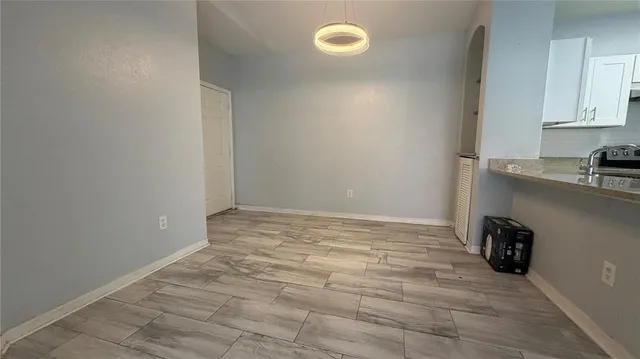 a view of a kitchen with a sink