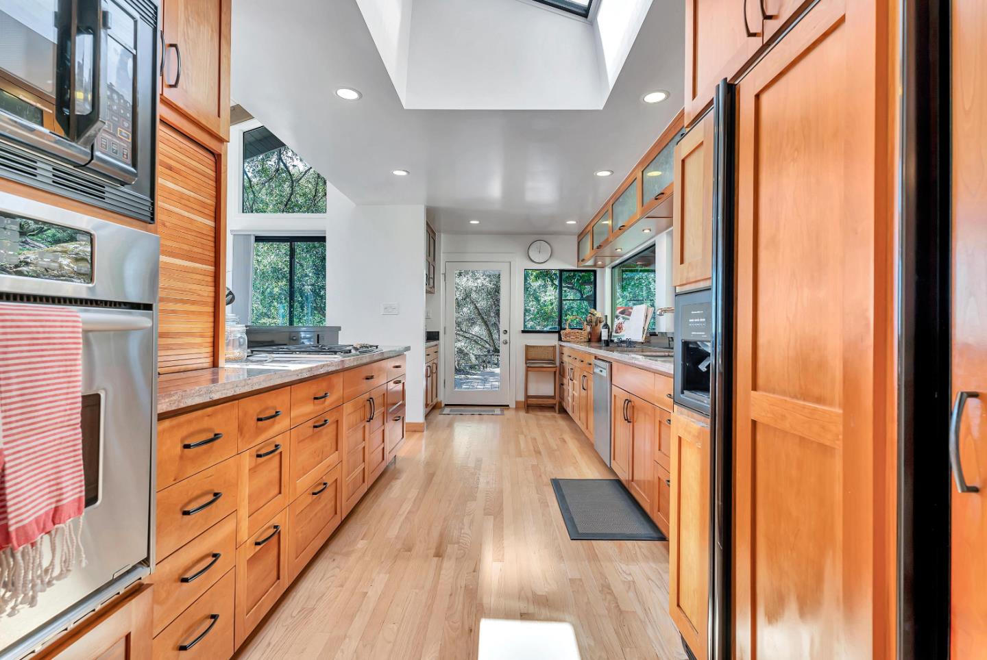 19170 Old Vineyard Road Los Gatos, CA 95033 - Photo 15 of 52 a large space with wooden floor and large windows