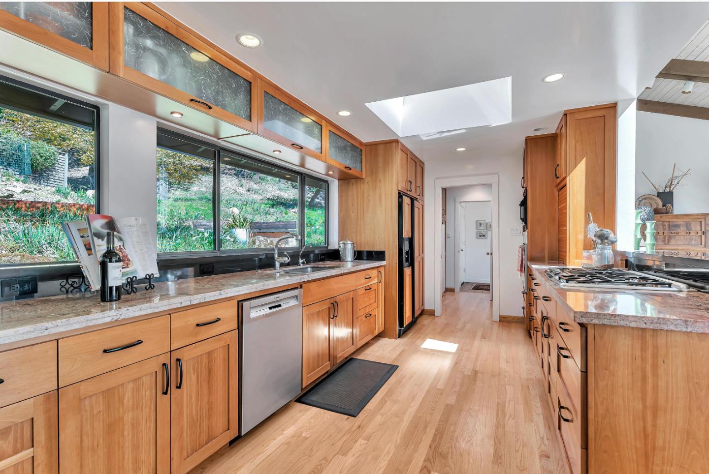 19170 Old Vineyard Road Los Gatos, CA 95033 - Photo 16 of 52 a large kitchen with stainless steel appliances granite countertop a large window and a counter space