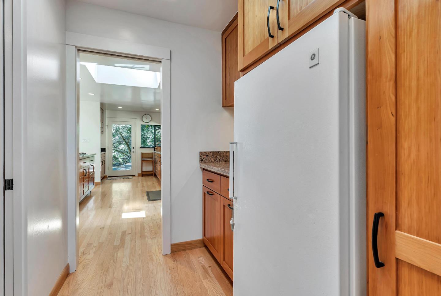 19170 Old Vineyard Road Los Gatos, CA 95033 - Photo 21 of 52 a view of hallway with livingroom and wooden floor