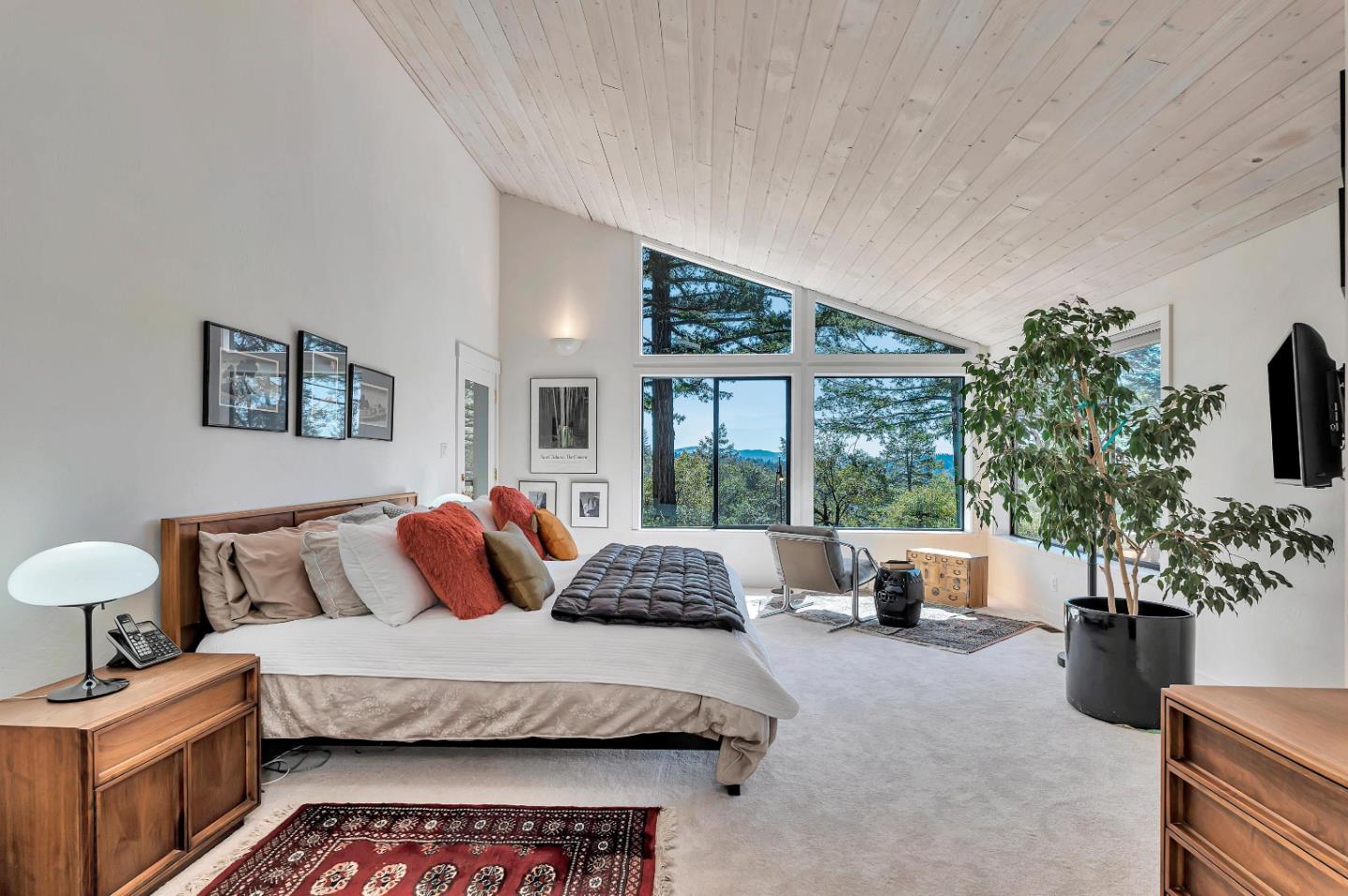 19170 Old Vineyard Road Los Gatos, CA 95033 - Photo 24 of 52 a bedroom with furniture and a large window