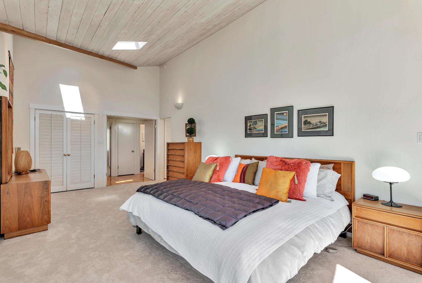 19170 Old Vineyard Road Los Gatos, CA 95033 - Photo 25 of 52 a spacious bedroom with a bed and a couch