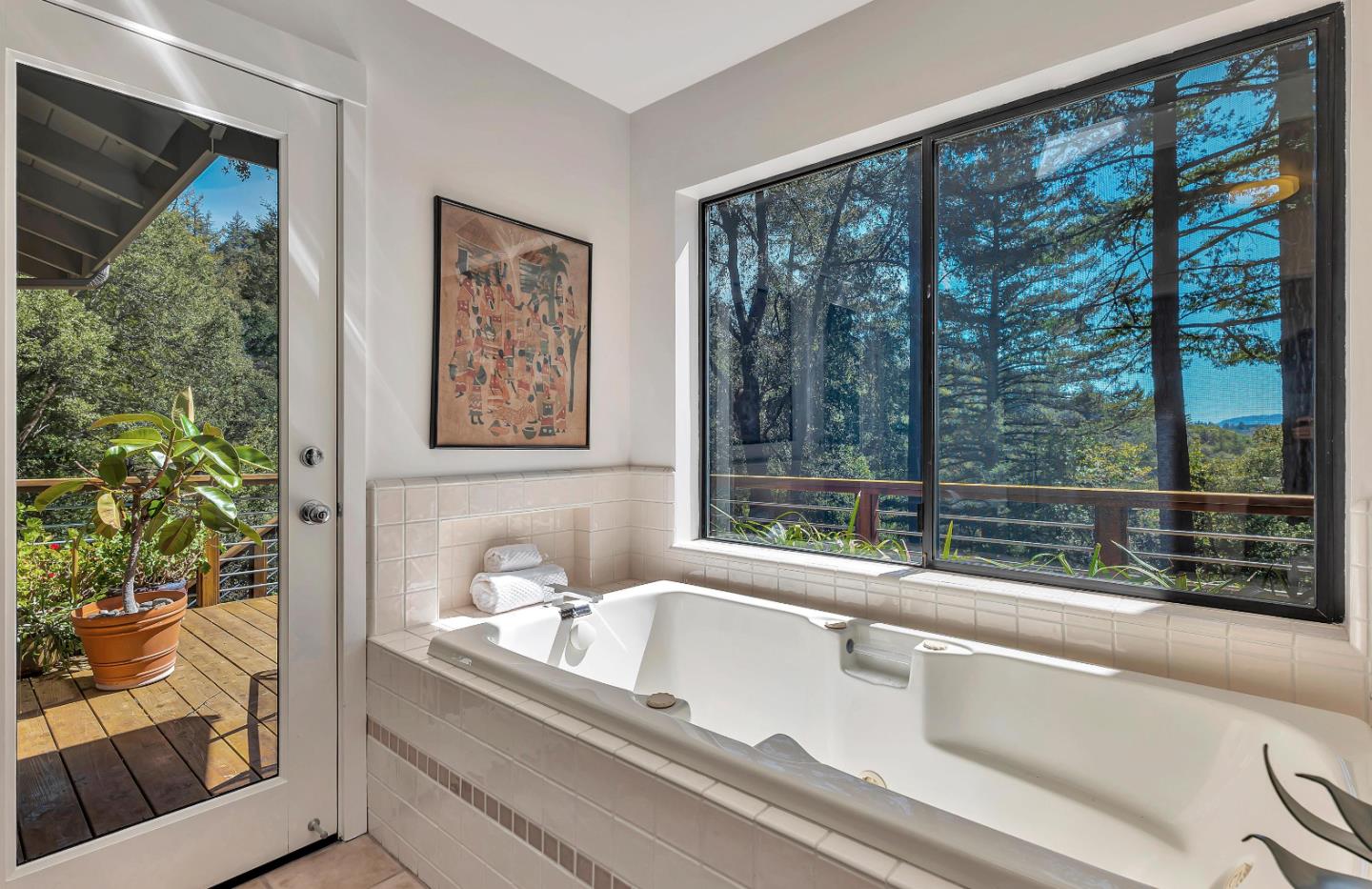 19170 Old Vineyard Road Los Gatos, CA 95033 - Photo 29 of 52 a view of a living room and a floor to ceiling window