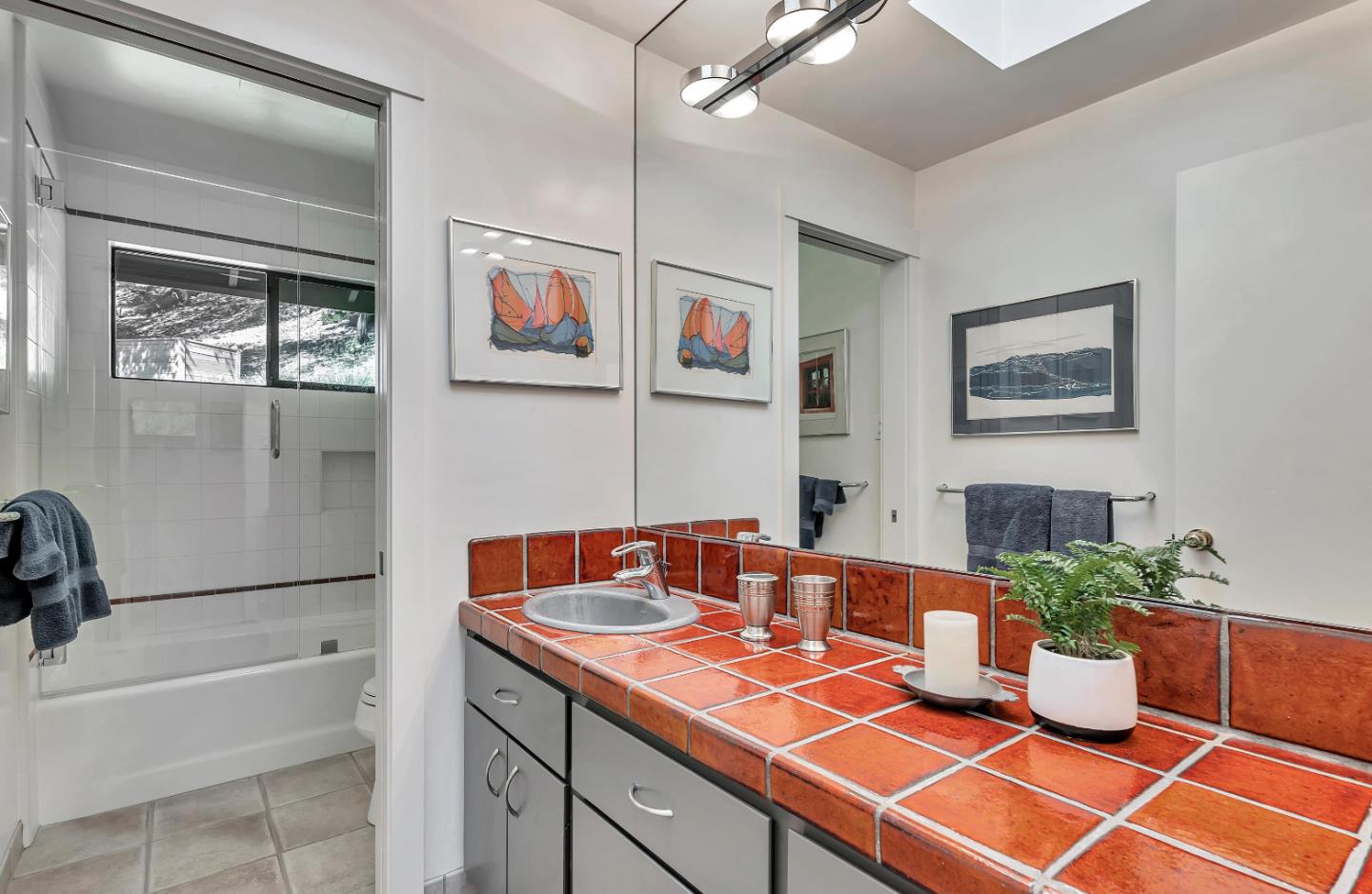 19170 Old Vineyard Road Los Gatos, CA 95033 - Photo 35 of 52 a living room with a couch and a potted plant