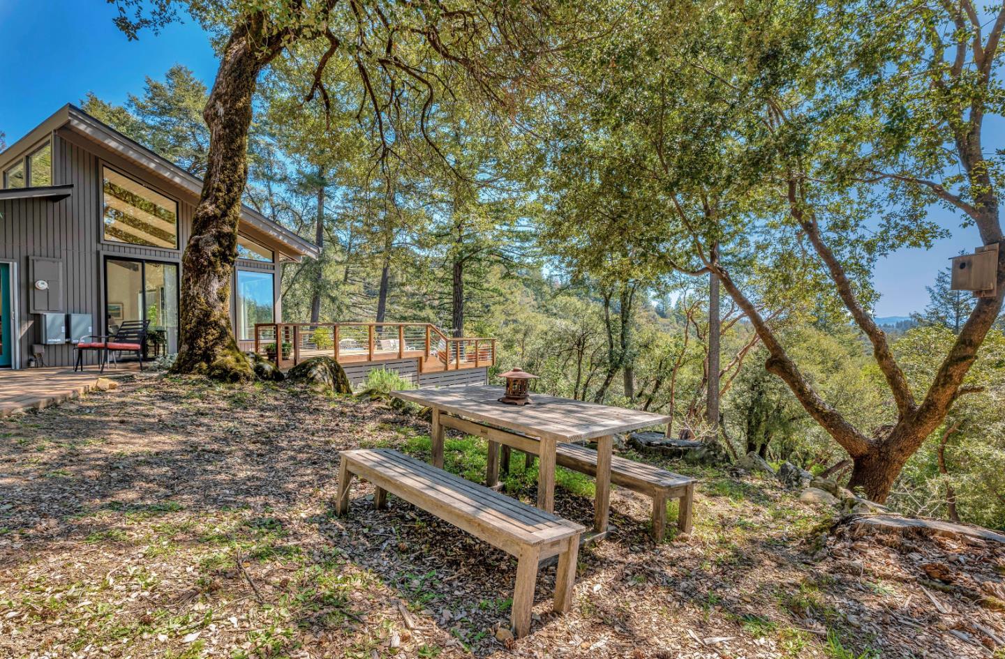 19170 Old Vineyard Road Los Gatos, CA 95033 - Photo 42 of 52 a view of a chairs and tables in the backyard