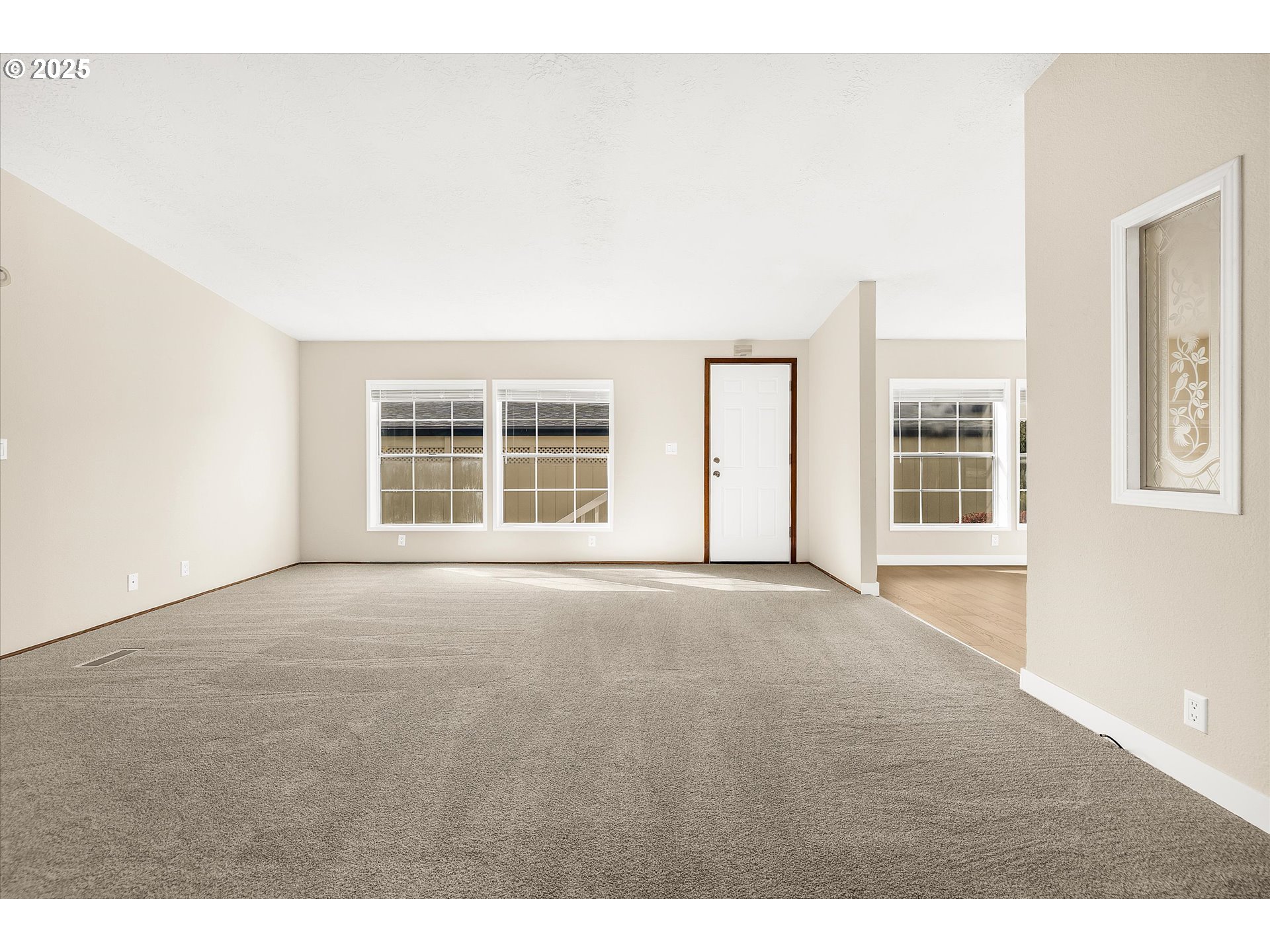 809 Southwest Crestview Way Troutdale, OR 97060 - Photo 16 of 40 a view of an empty room with a window