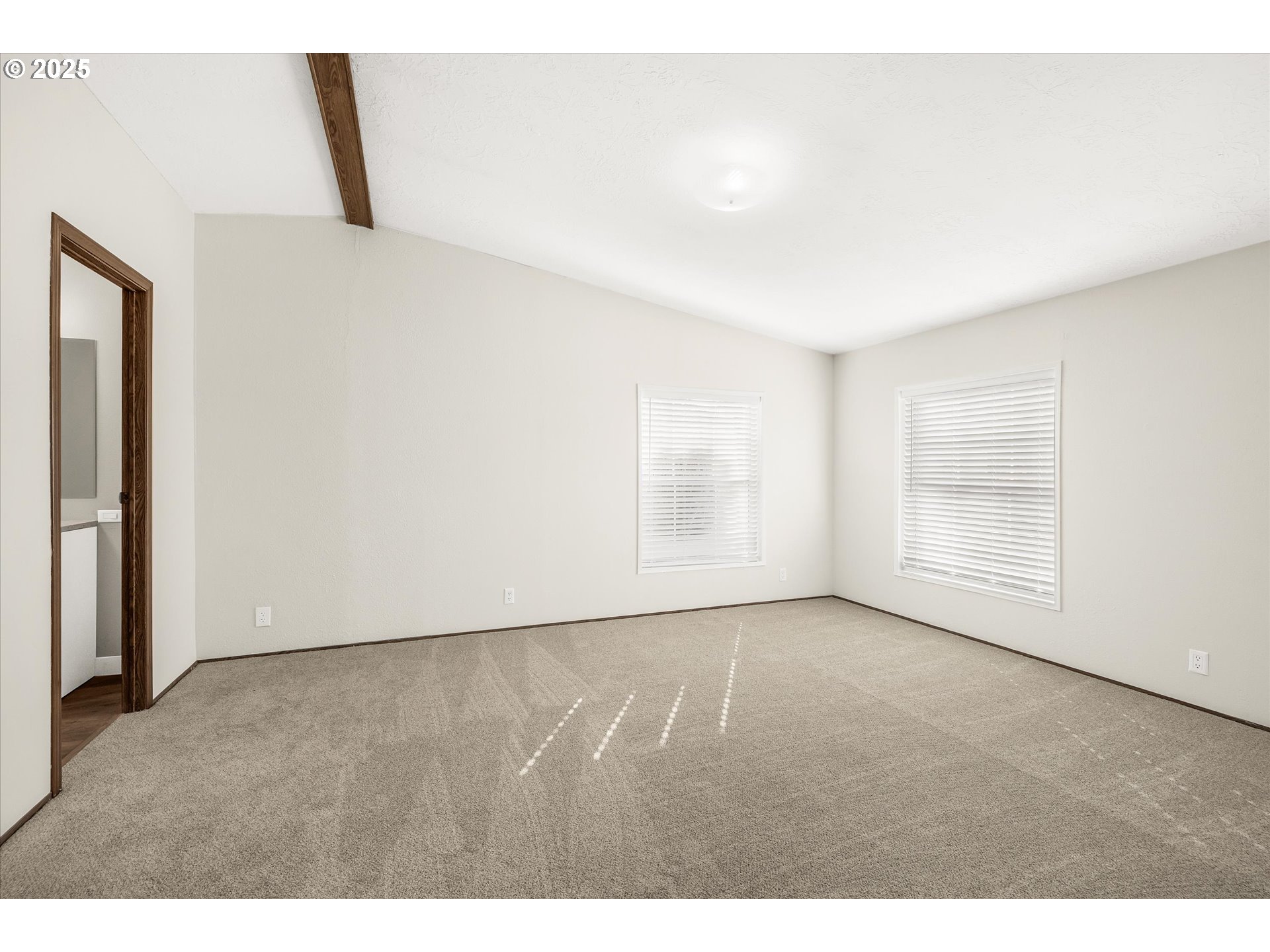 809 Southwest Crestview Way Troutdale, OR 97060 - Photo 18 of 40 a view of an empty room with a window