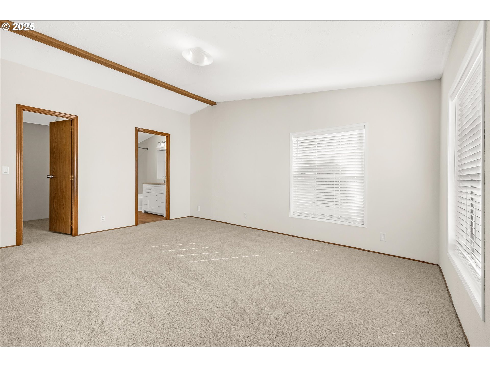 809 Southwest Crestview Way Troutdale, OR 97060 - Photo 19 of 40 a view of an empty room with a window