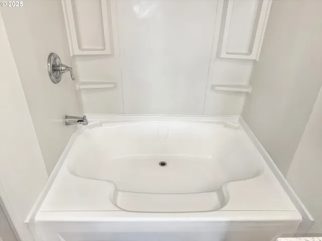 a bathroom with a bathtub