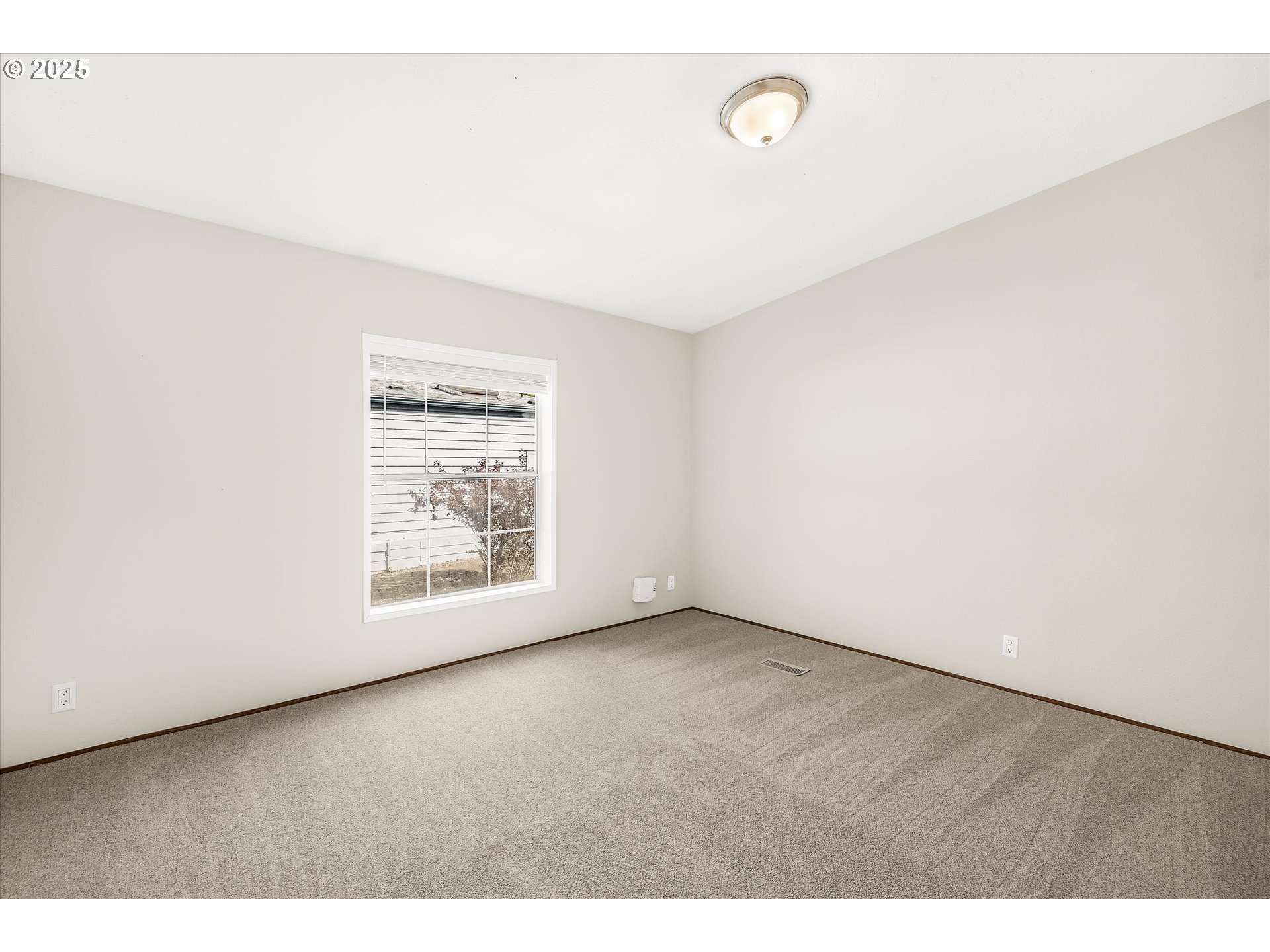 809 Southwest Crestview Way Troutdale, OR 97060 - Photo 27 of 40 a view of an empty room with a window