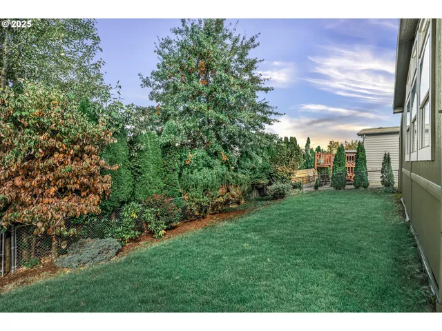 a view of a backyard with garden