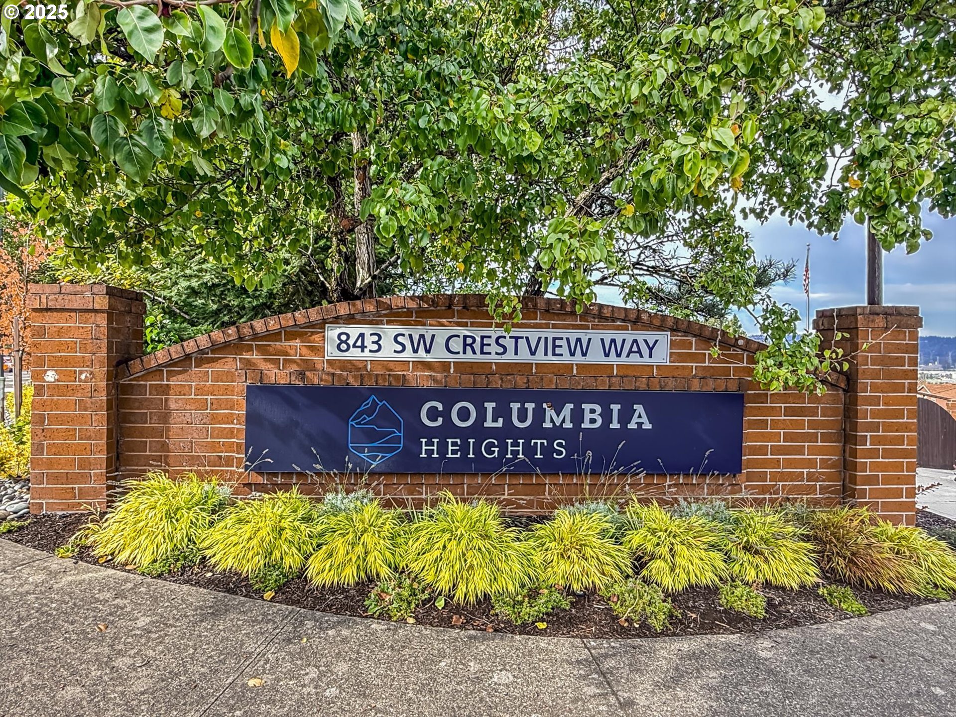 809 Southwest Crestview Way Troutdale, OR 97060 - Photo 8 of 40 a sign that is sitting in front of flowers