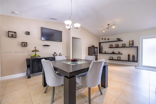 a view of a dining room with furniture