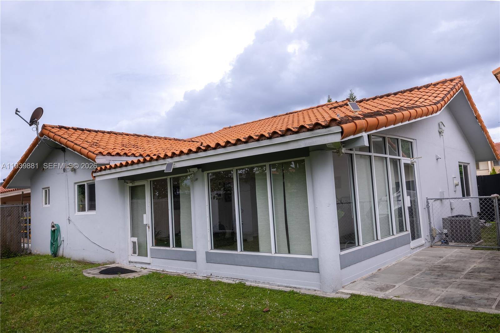 14766 Southwest 81st Street Miami, FL 33193 - Photo 33 of 39 a view of a house with yard