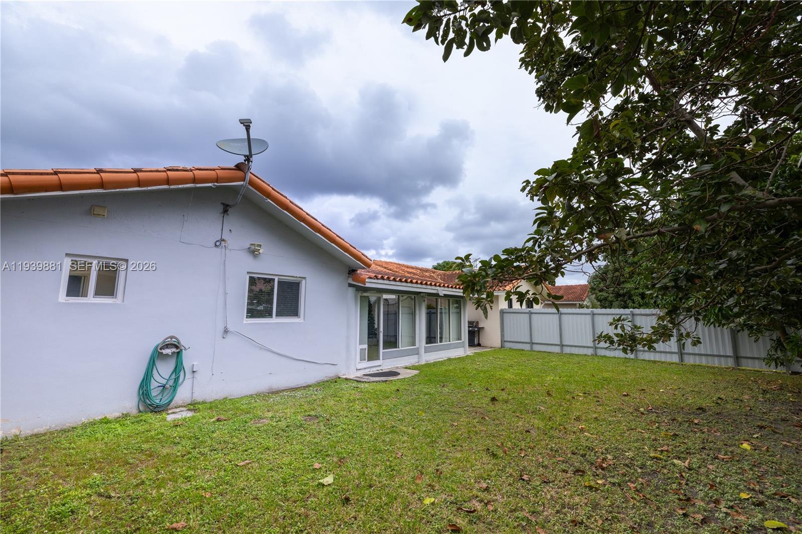 14766 Southwest 81st Street Miami, FL 33193 - Photo 34 of 39 a house view with a garden space