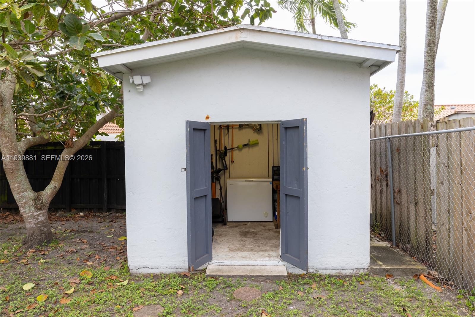 14766 Southwest 81st Street Miami, FL 33193 - Photo 35 of 39 a view of a house with backyard