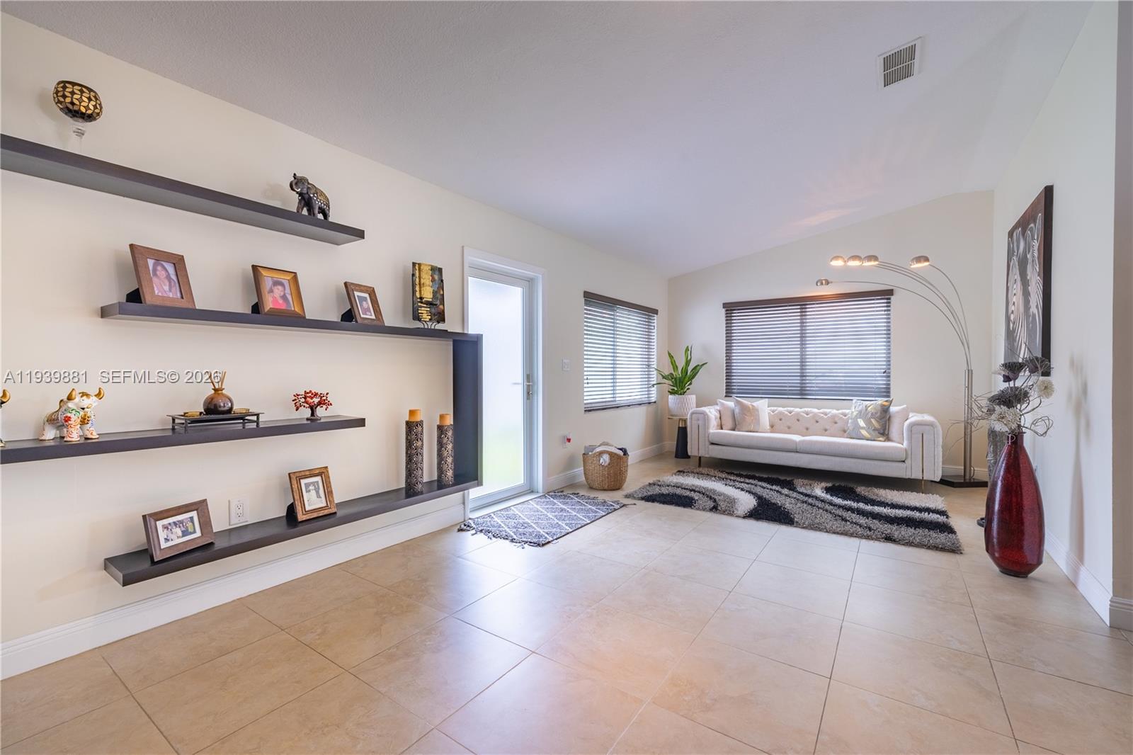 14766 Southwest 81st Street Miami, FL 33193 - Photo 8 of 39 a spacious bedroom with a bed and a window